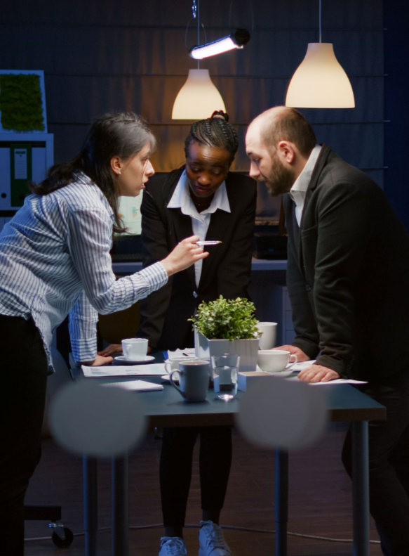 focused-leader-woman-enter-office-meeting-room-lean-conference-table-brainstorming-business-company-presentation-late-night-diverse-multi-ethnic-teamwork-solving-management-strategy
